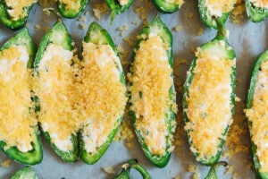 Stuffed of jalapeno poppers before cooking.