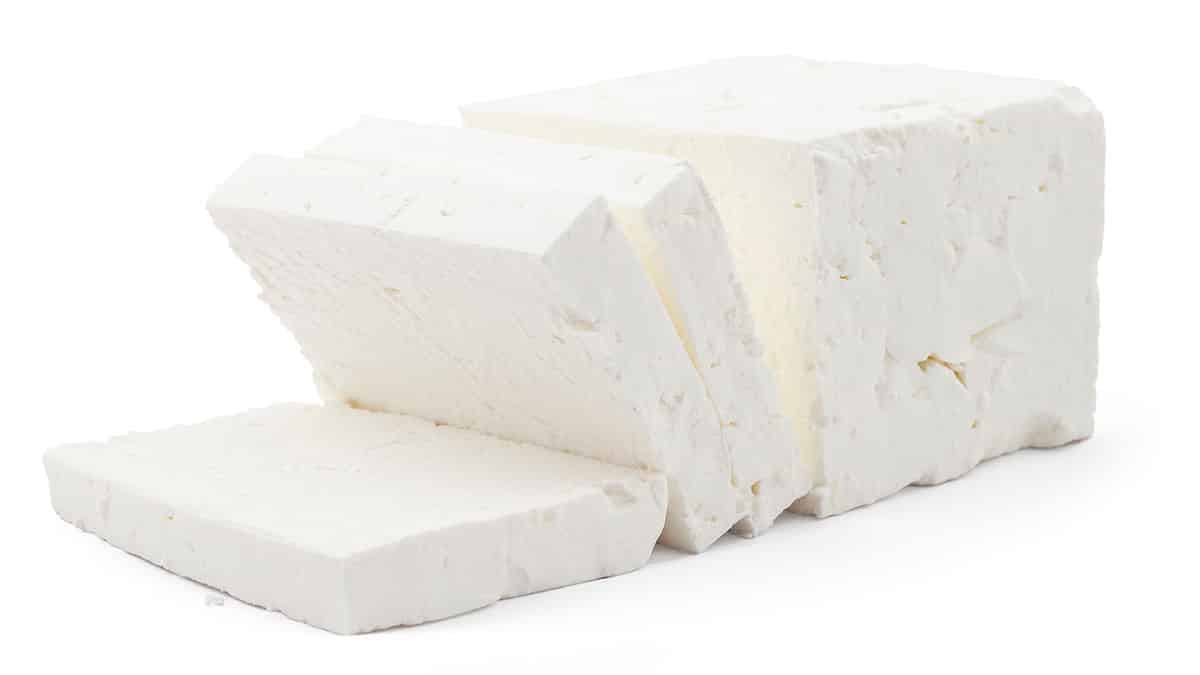 Feta cheese isolated on a white background.