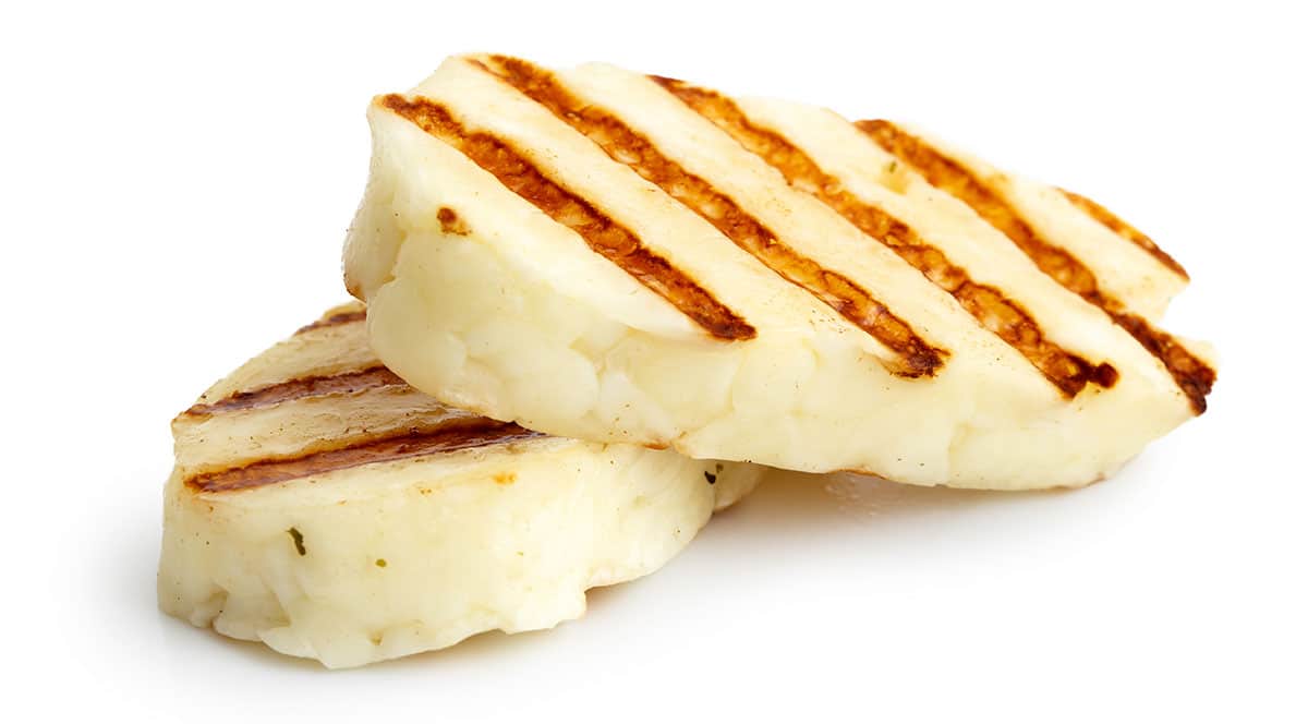 Halloumi cheese isolated on a white background.