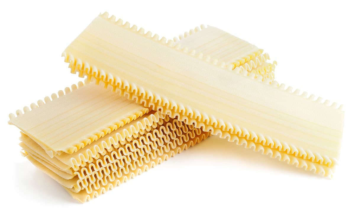 Lasagna noodles on a white background. 