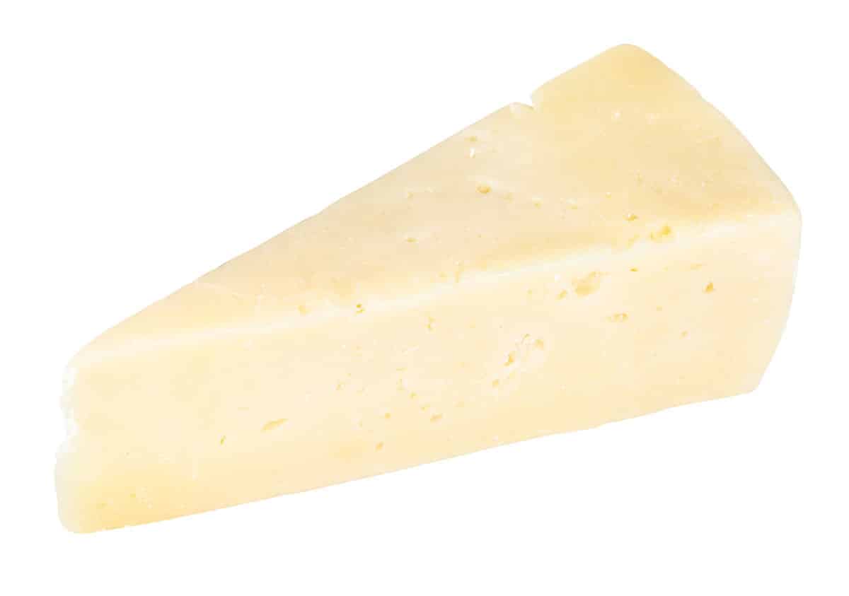 Pecorino romano cheese isolated on a white background.
