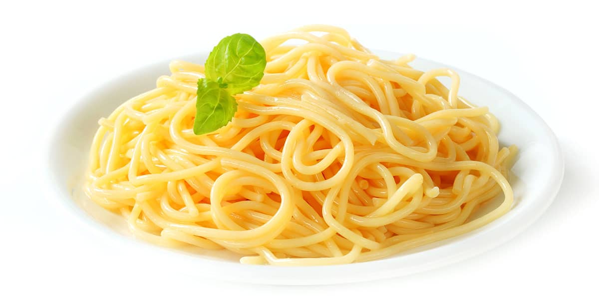 Spaghetti pasta on a white background. 