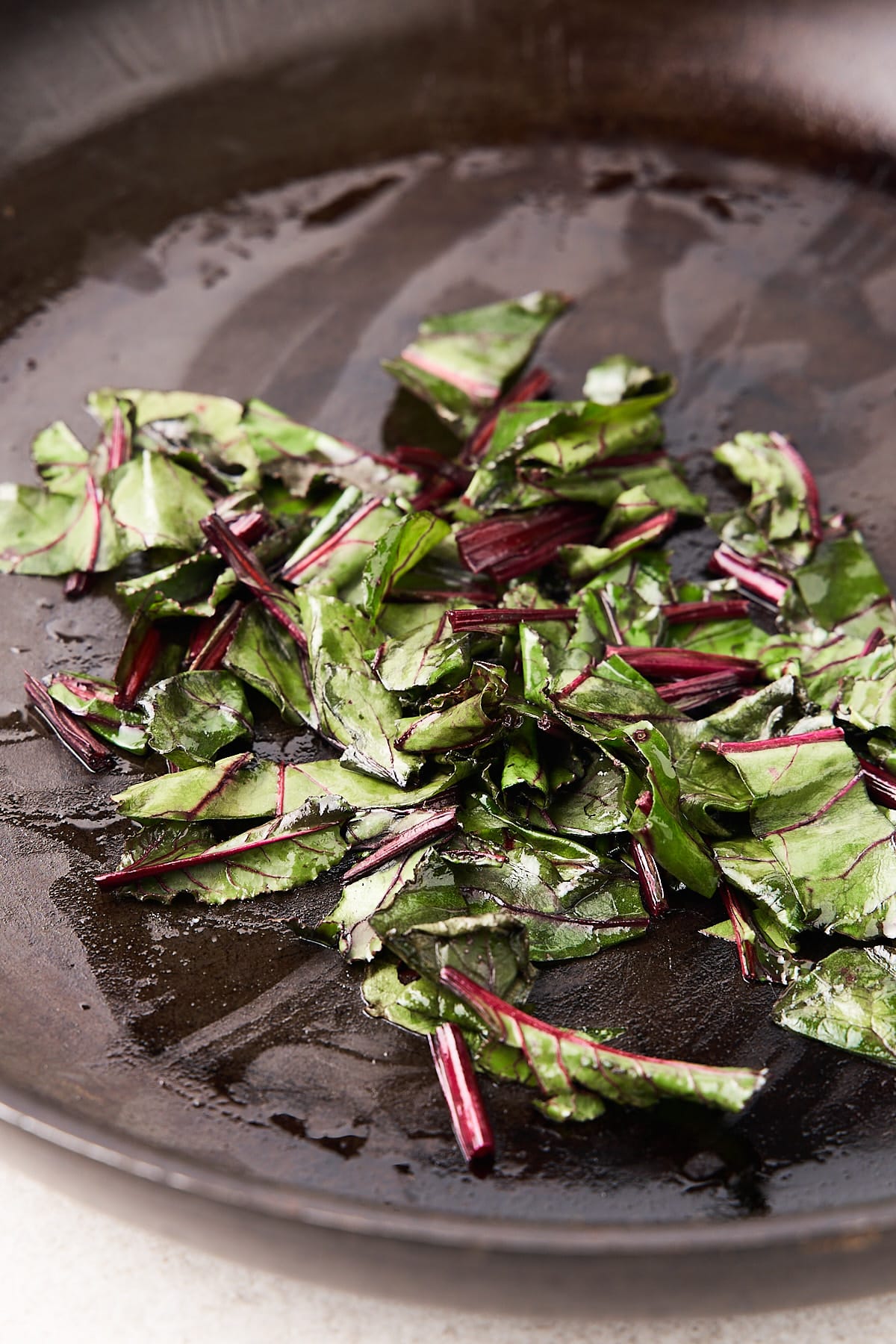 Beet greens in a skillet.