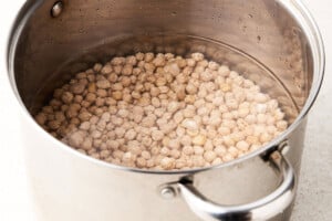 Uncooked chickpeas in a pot.