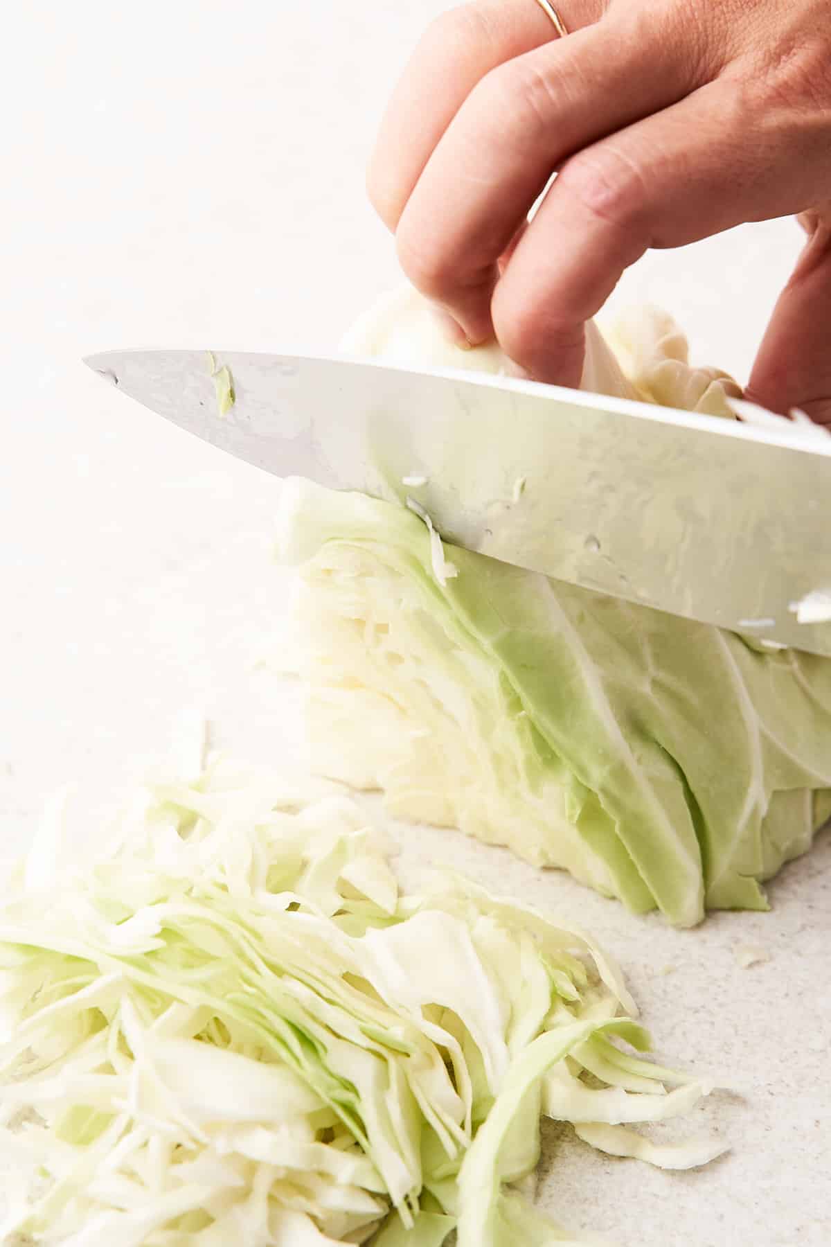 Slicing cabbage.
