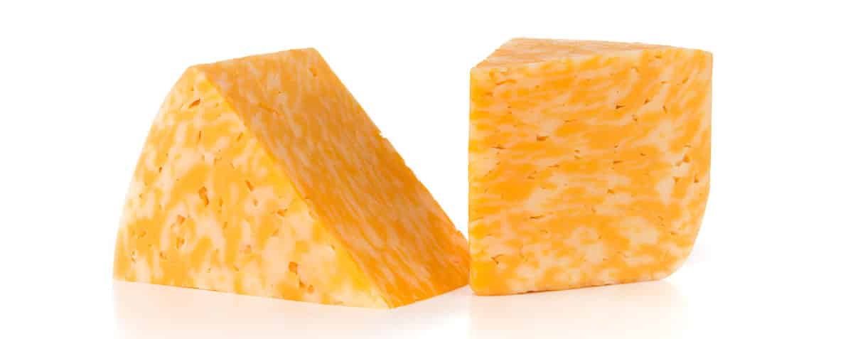 Colby cheese isolated on white.