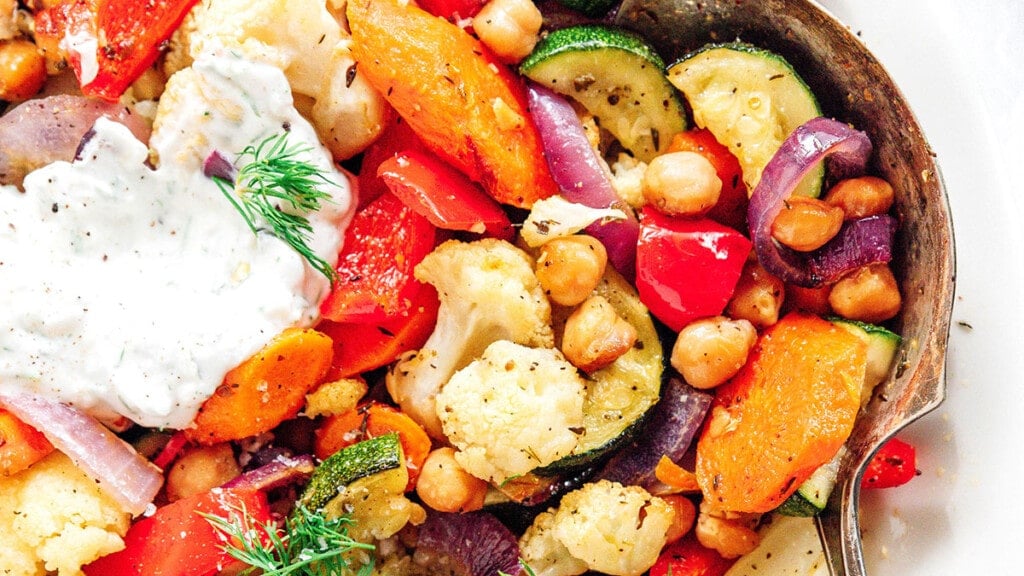Cooked vegetables with yogurt sauce.
