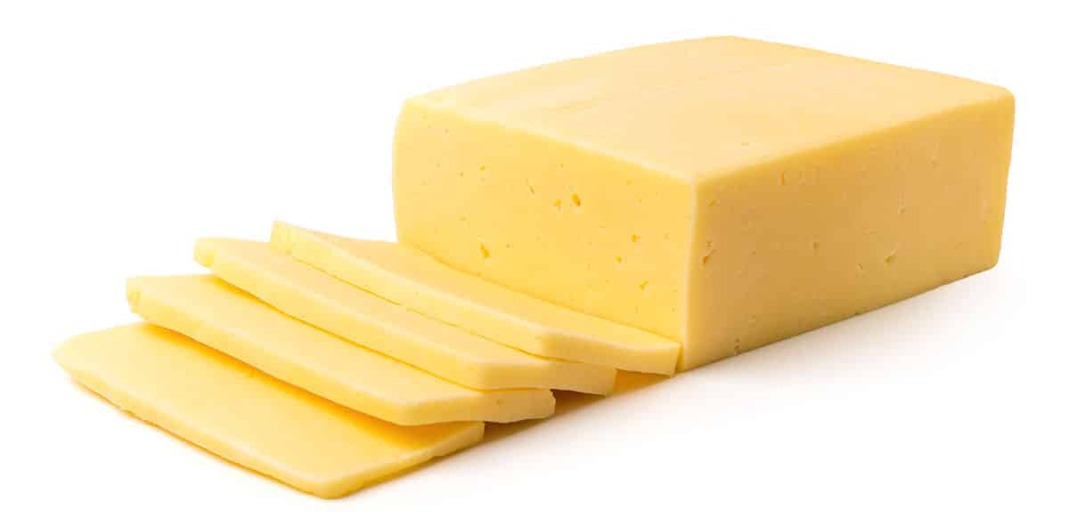 Monterey jack cheese isolated on white.