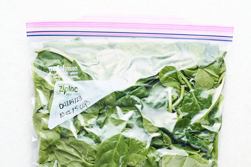Freezing spinach in a bag.