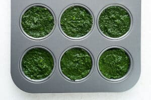 Freezing spinach by putting it in a muffin tin.