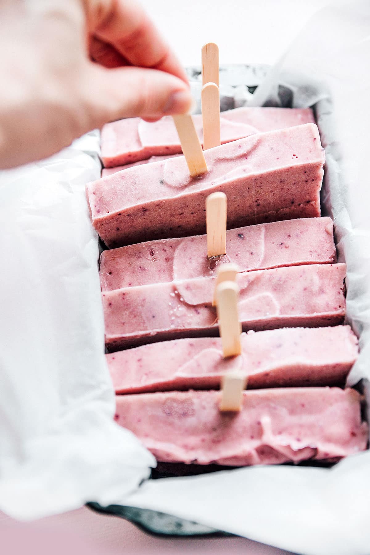 DIY popsicle mold idea with sliceable homemade popsicles in a loaf pan