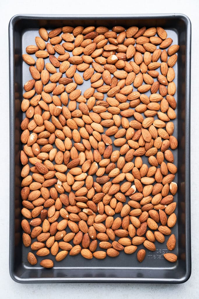 Almonds on a baking pan.