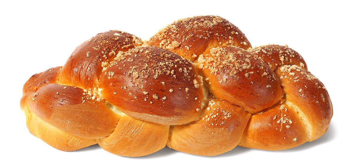 Challah bread on white background.