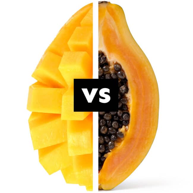 Mango vs papaya on white background.