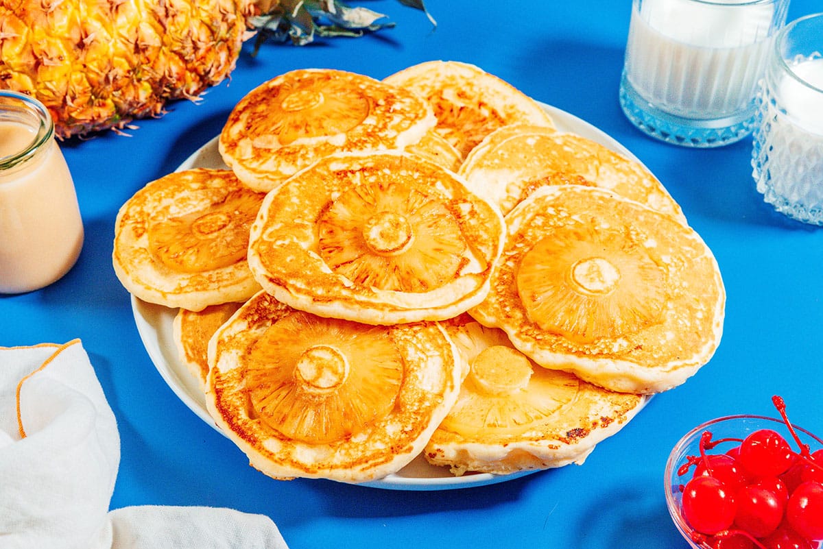 Pineapple upside down pancakes on a plate.
