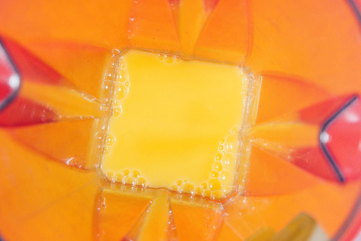 Orange juice in a blender.