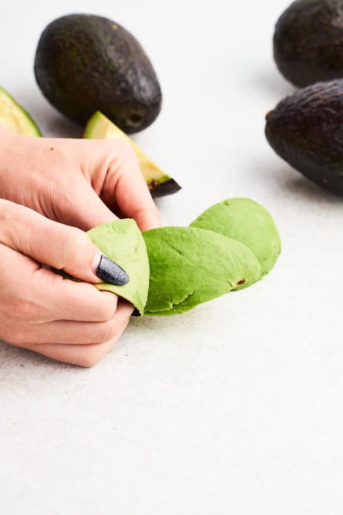 Peeling an avocado.