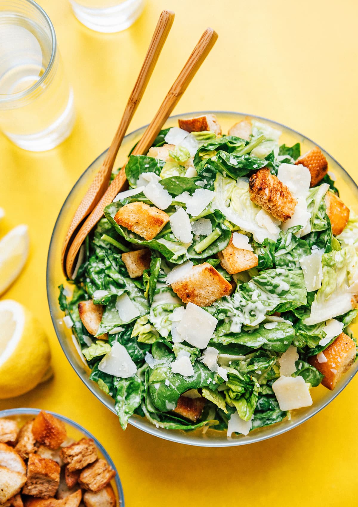 Caesar salad in a bowl with croutons, romaine lettuce, and parmesan