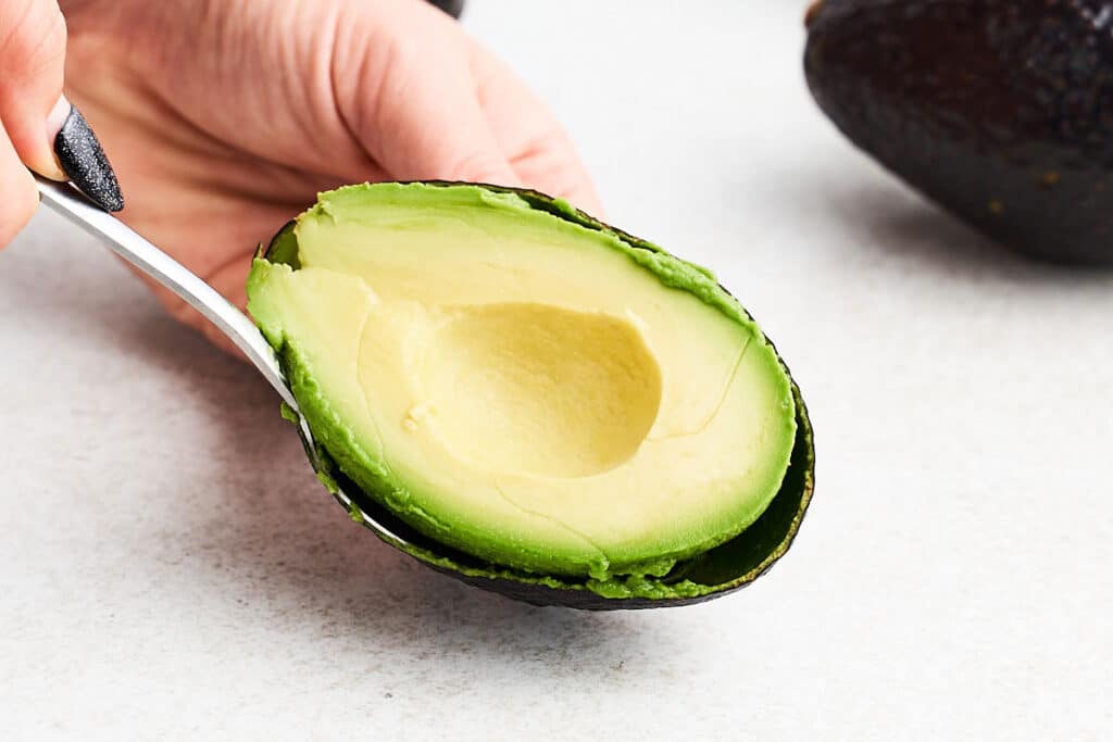 Spoon method for cutting an avocado.