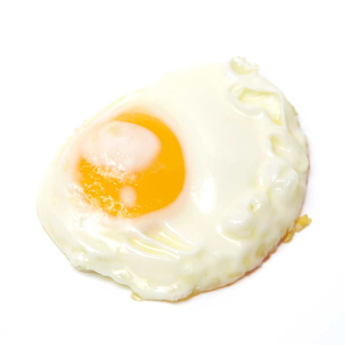 Over easy egg on a white background.