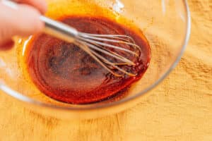 Mixing a marinade.
