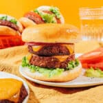 Tofu burger with cheese on a bun.