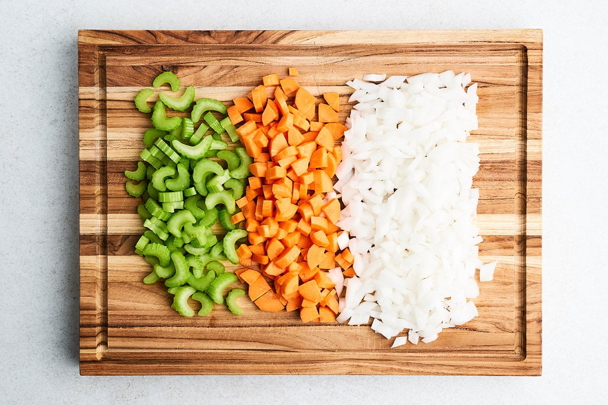 Cutting vegetables for mirepoix.