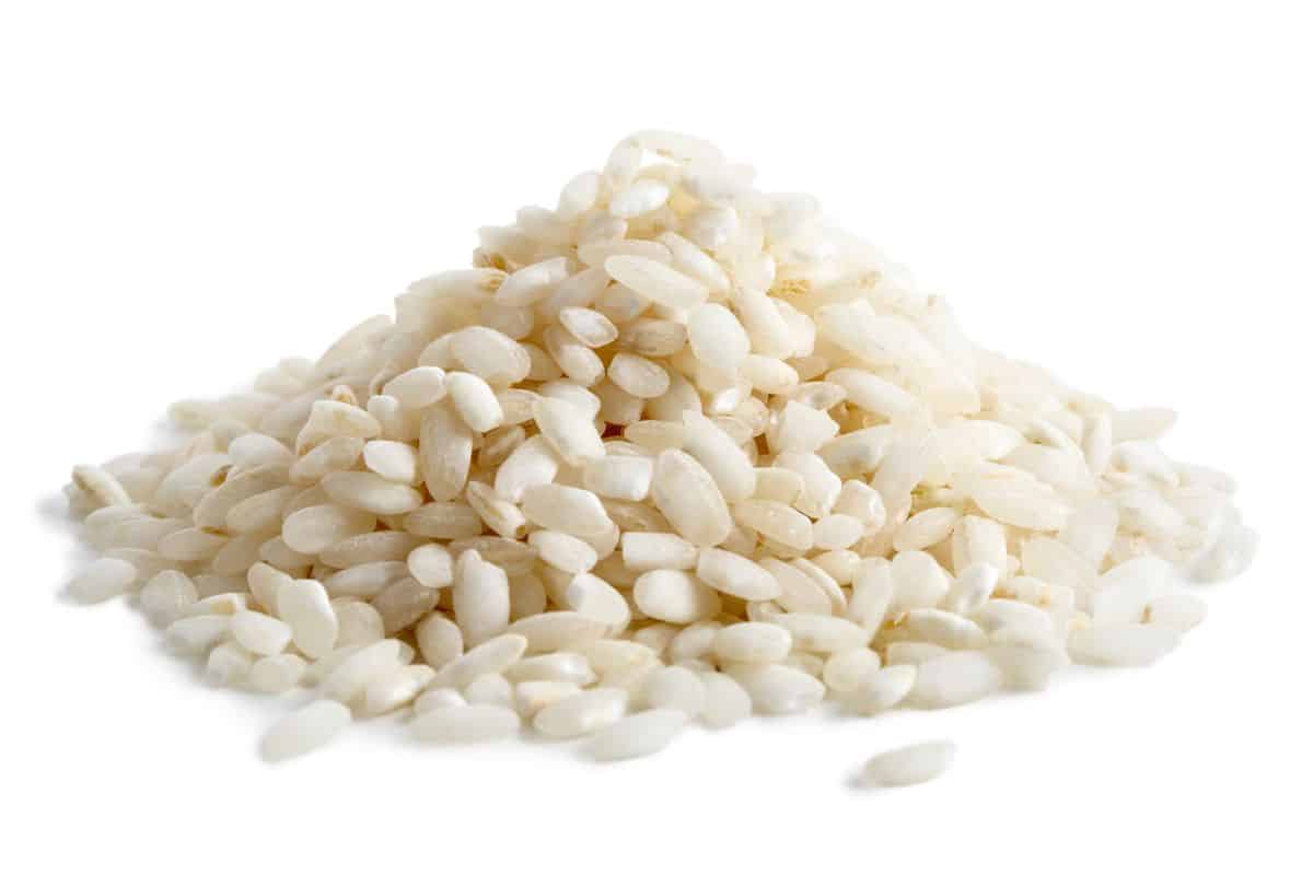 Arborio rice on an isolated white background.