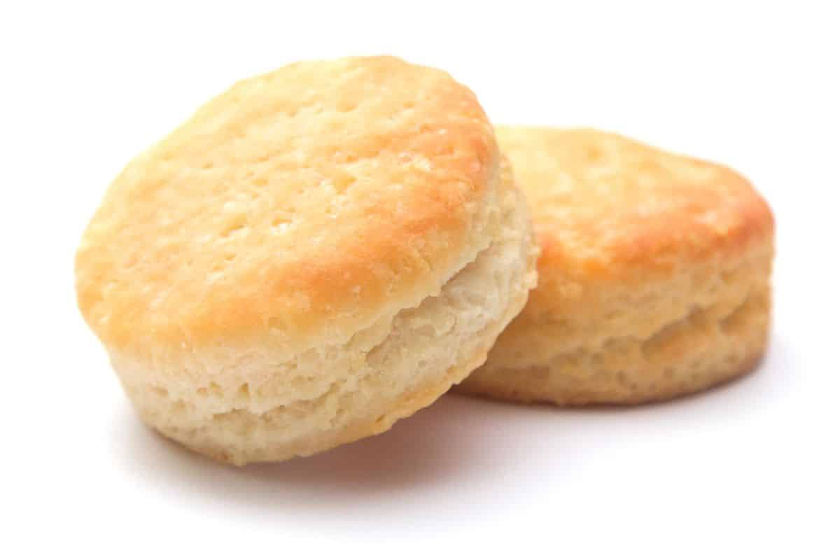 Two biscuits on a white background.