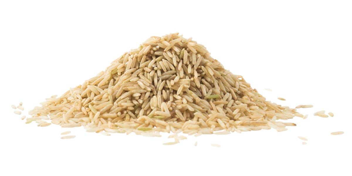 Brown basmati rice on an isolated white background.