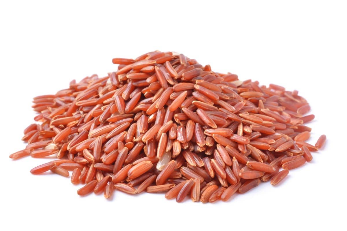 Colusari red rice on an isolated white background.