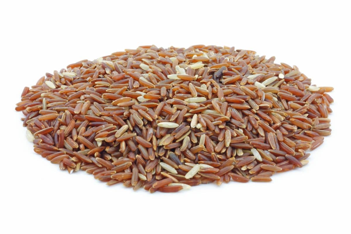 Himalayan red rice on an isolated white background.