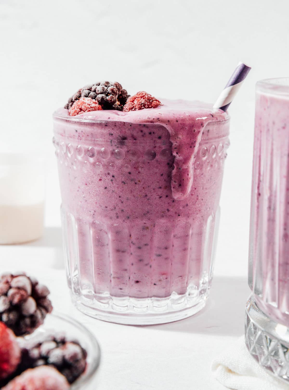 Purple protein smoothie in a glass.