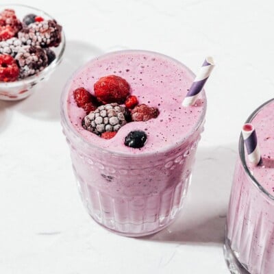 Purple protein smoothie in a glass.