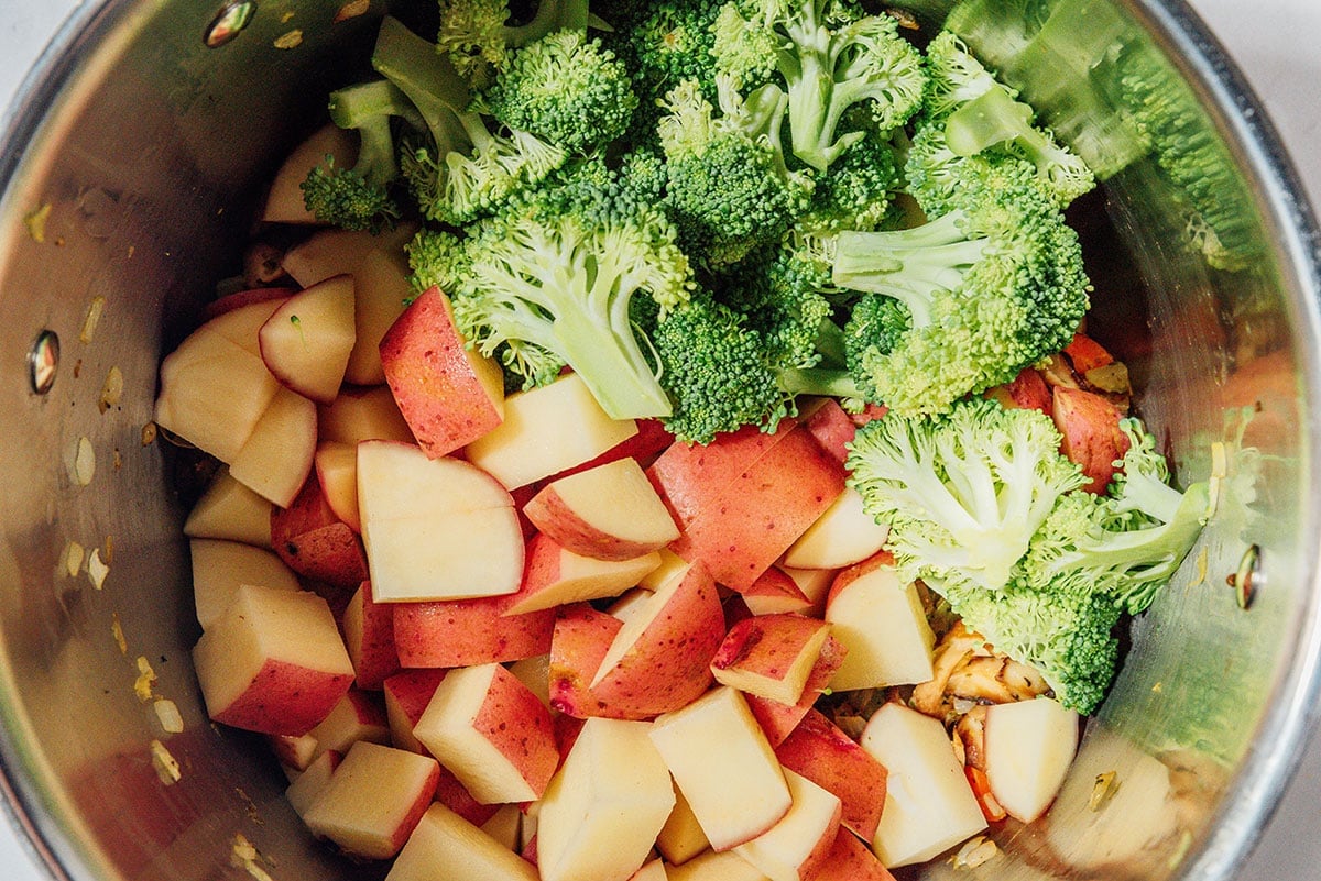 Broccoli and potato in a pot.