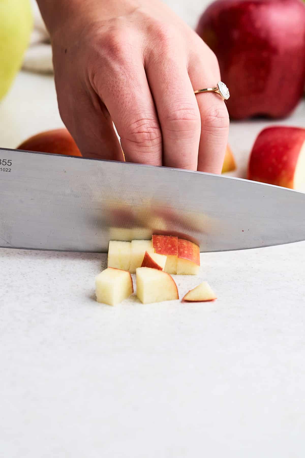Cutting an apple into cubes.