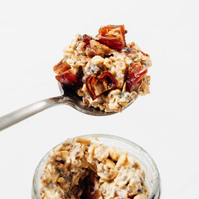 Spoon of date overnight oats.
