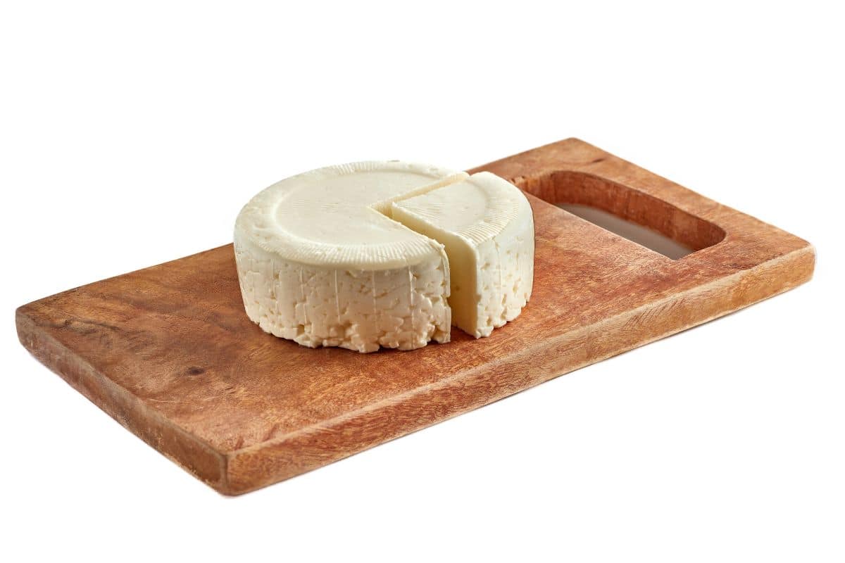 Panela cheese on a wood board.