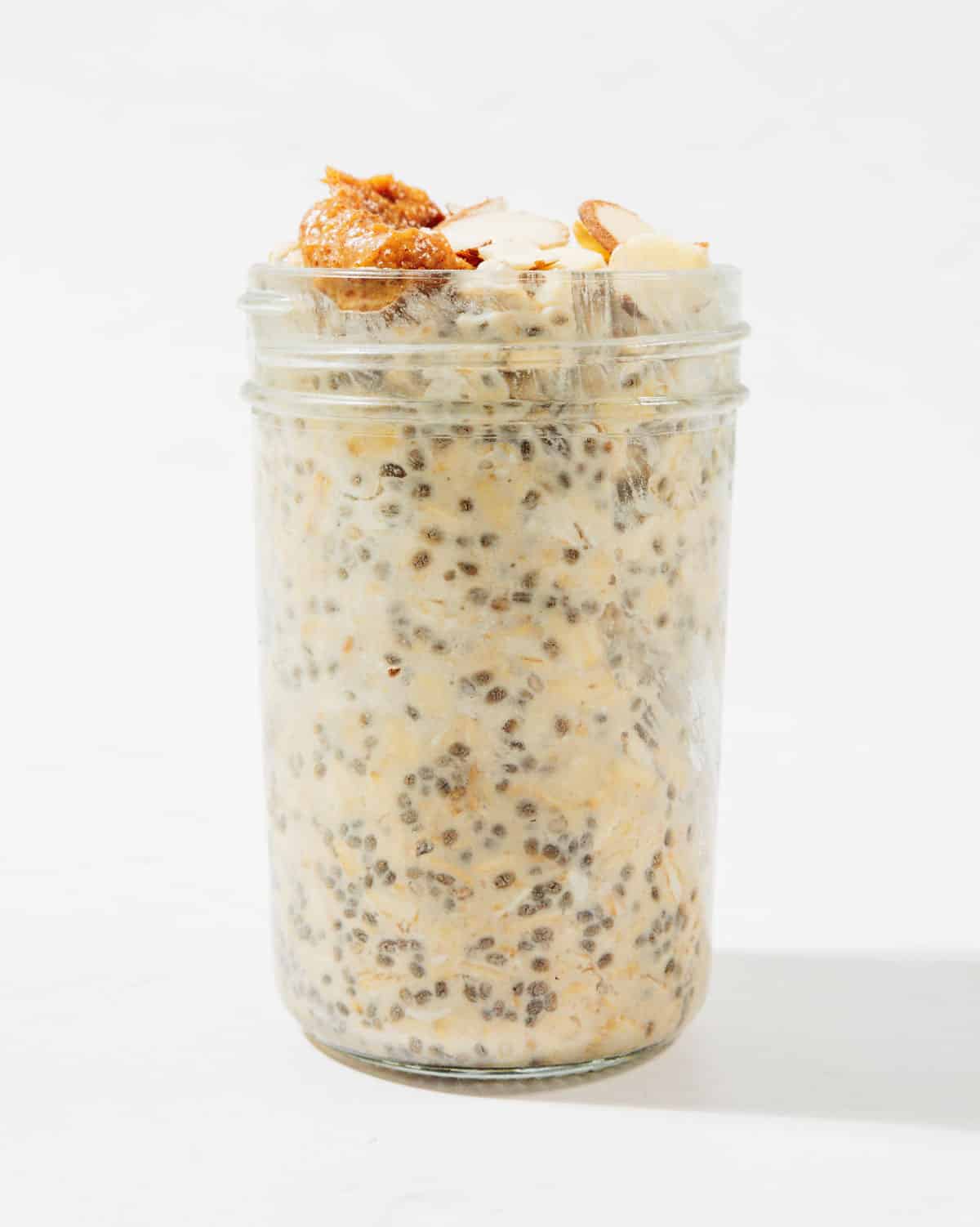 Ingredients for protein overnight oats in a jar.