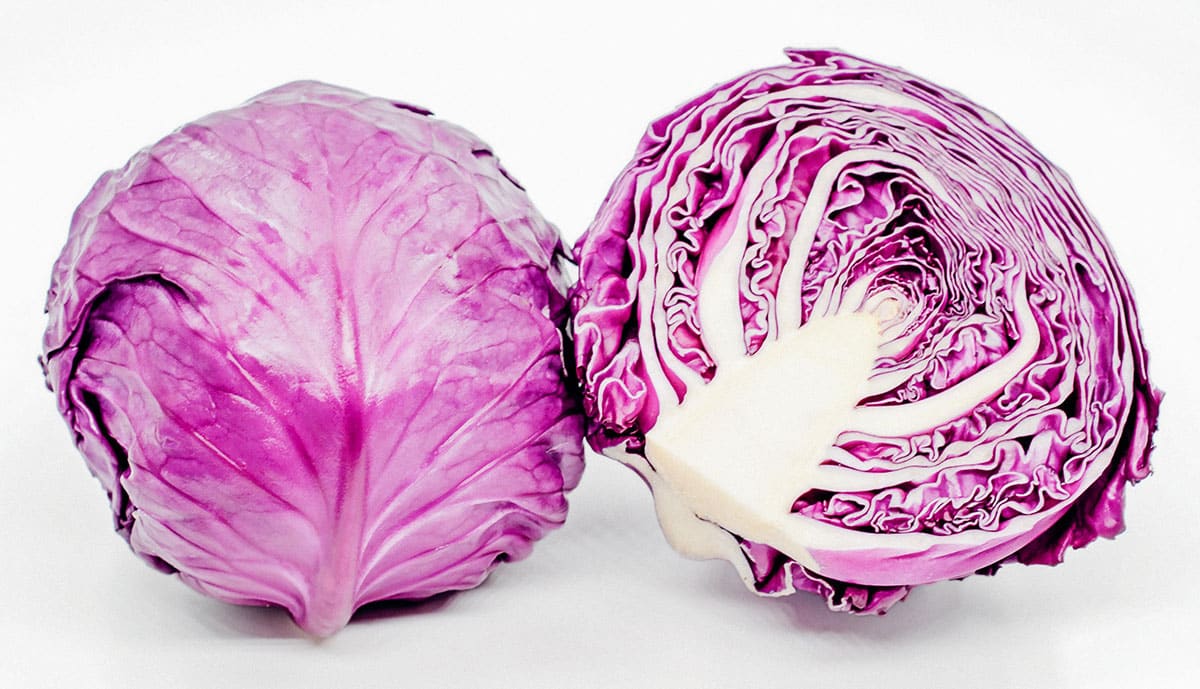Purple cabbage on a white background.