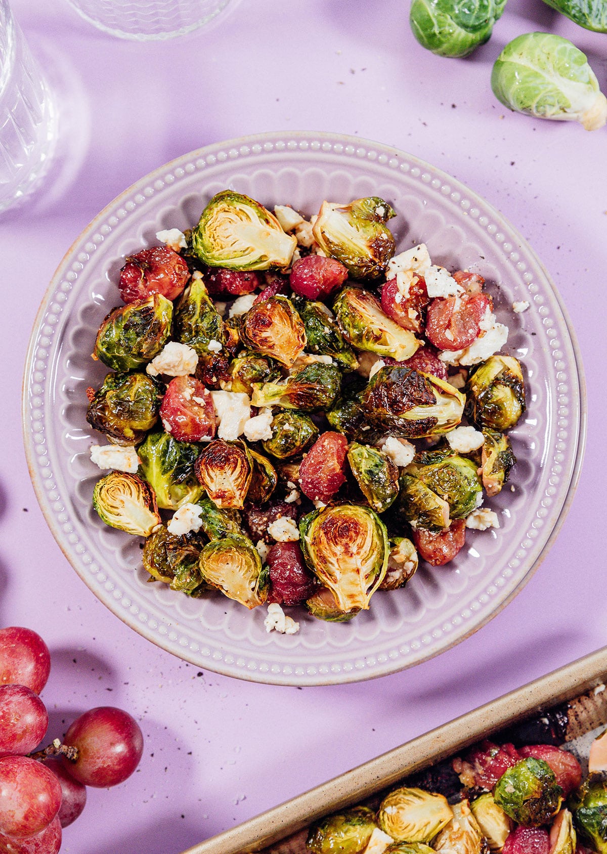 These roasted Brussels sprouts with balsamic and garlic are tossed together with grapes and feta cheese and become such a flavorful side dish! 