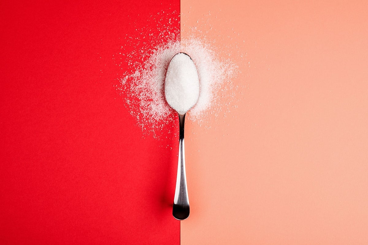 Sugar on a spoon.