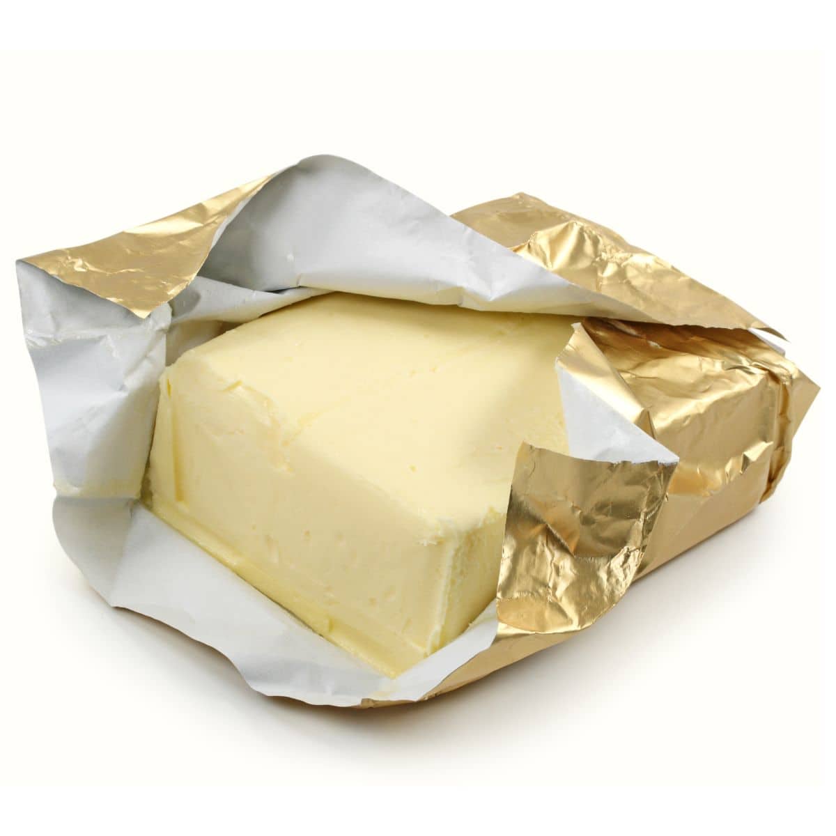 Butter in a gold wrapper on a white background.
