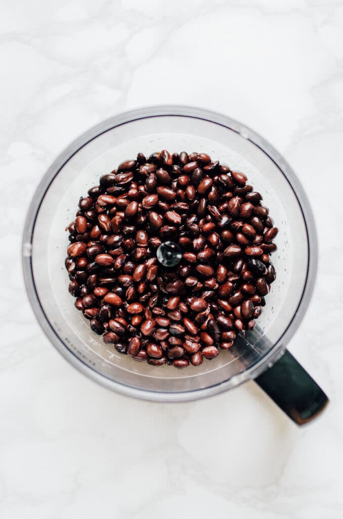 Black beans in a food processor.