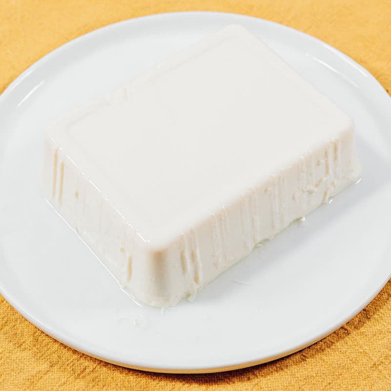Silken tofu on a plate.