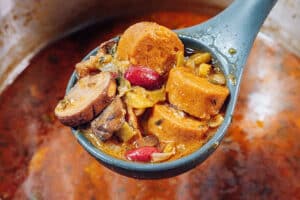 Vegan gumbo in a ladle.
