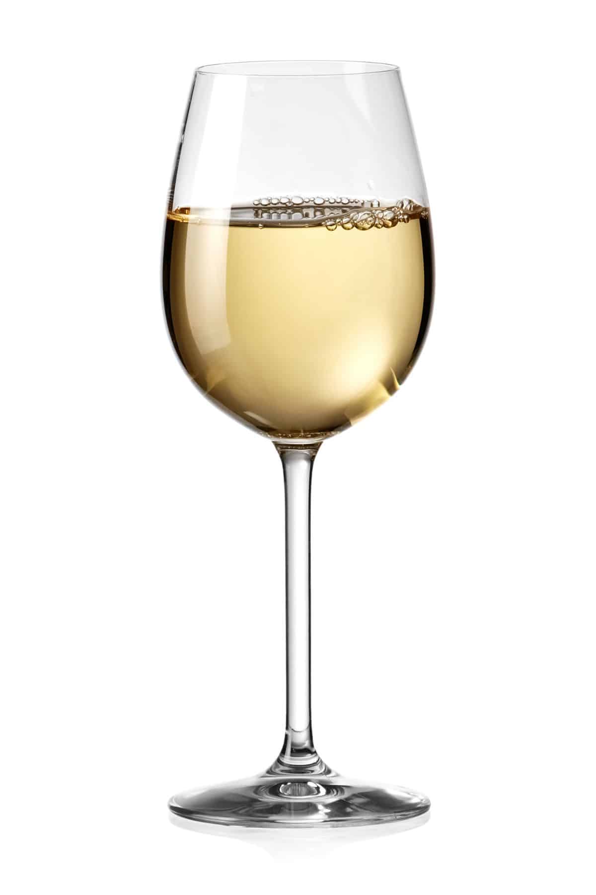 A glass of white wine on a white background.