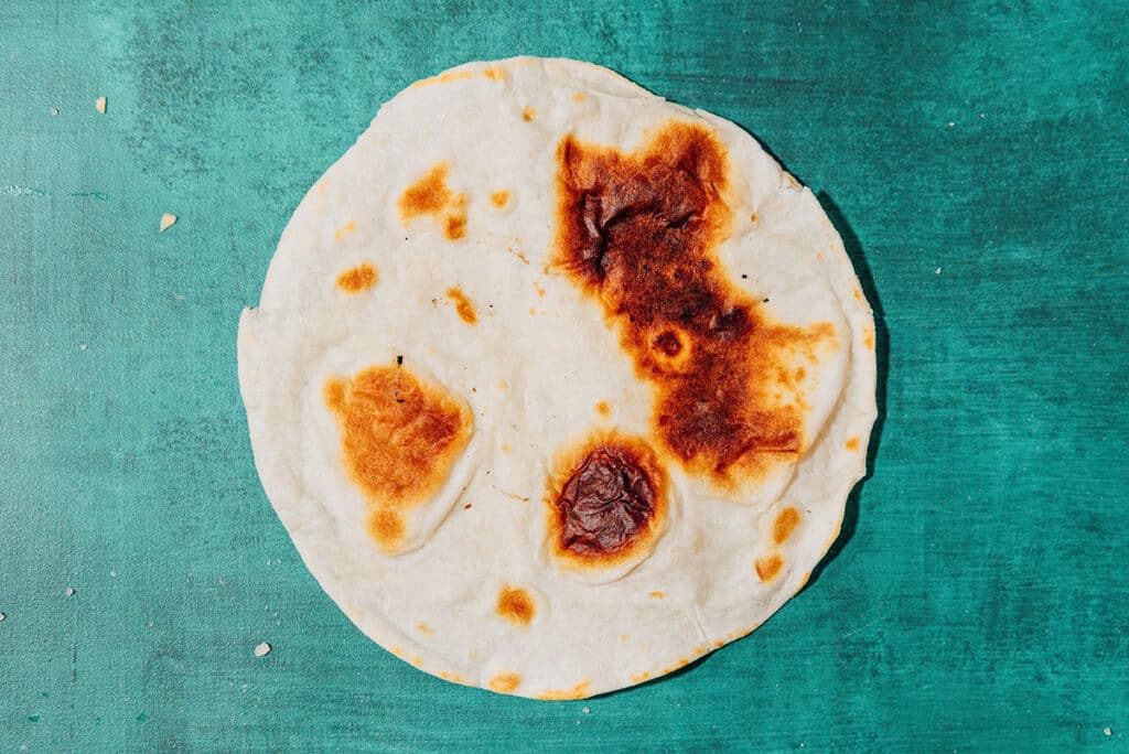 Tortilla on a blue background.