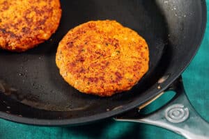 Chickpea burger on a blue background.