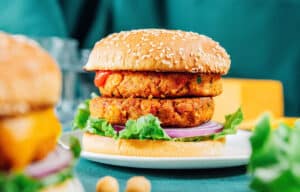 Chickpea burger on a blue background.